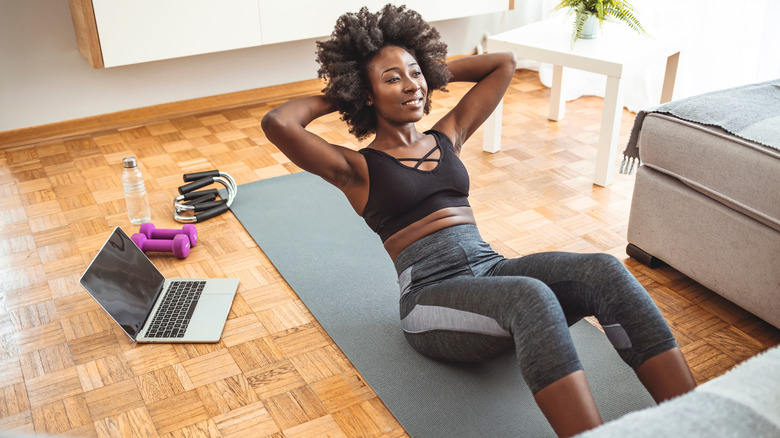 woman working out abs