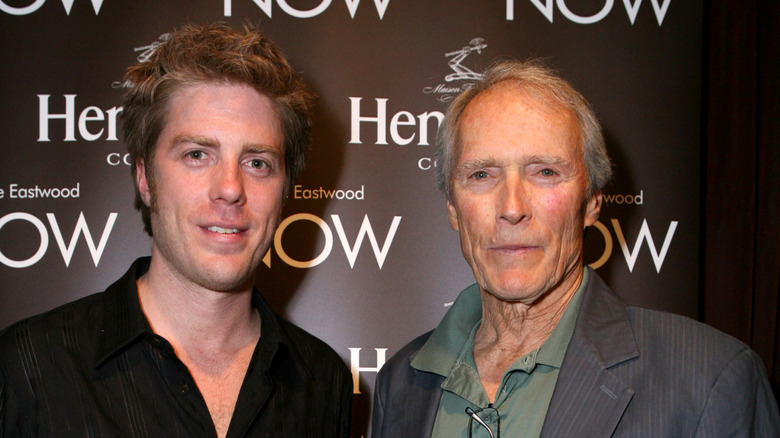 Kyle Eastwood and Clint Eastwood posing together at a red carpet event.