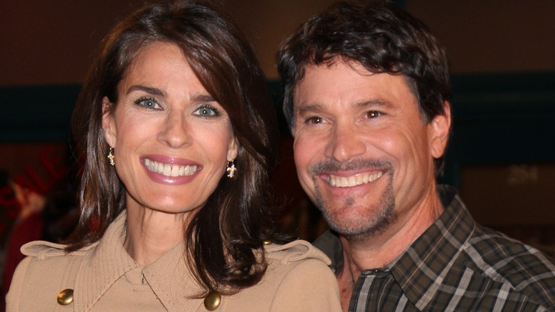 Peter Reckell and Kristian Alfonso pose for a photo together. 