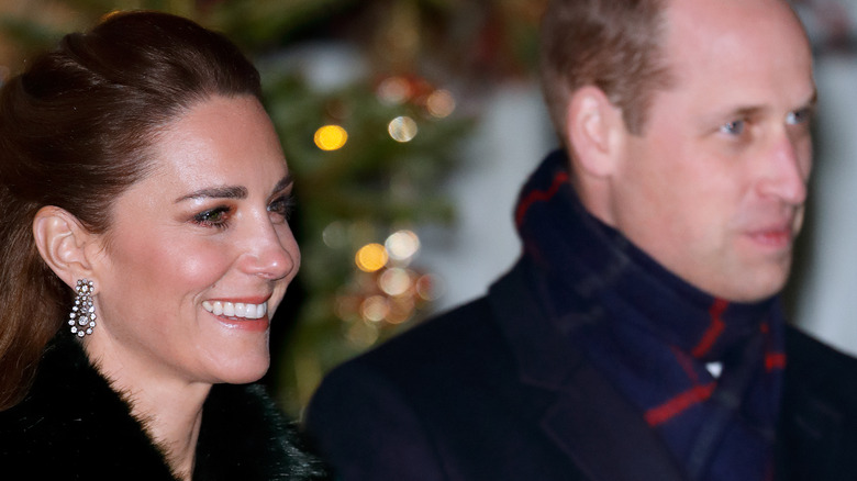 Prince William and Kate Middleton at an event. 