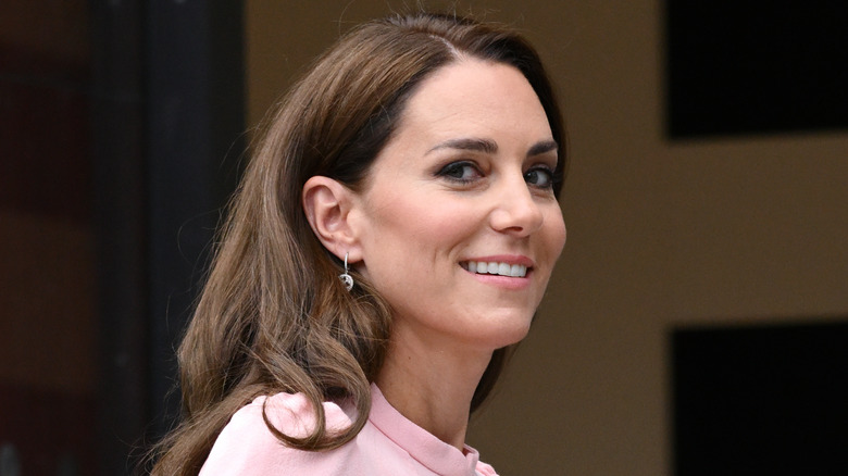 Kate Middleton smiling and looking to the side