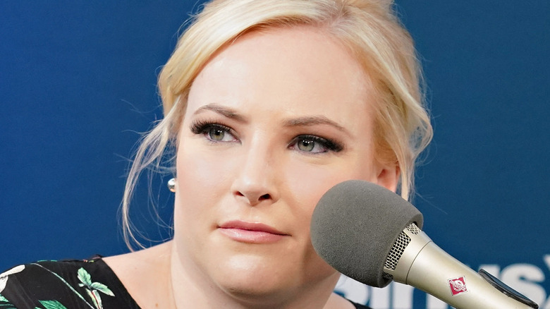 Meghan McCain staring in front of mic