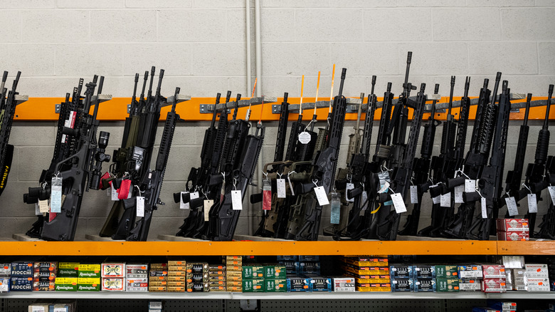 Shelves full of guns