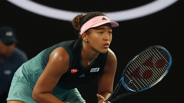 Naomi Osaka playing tennis