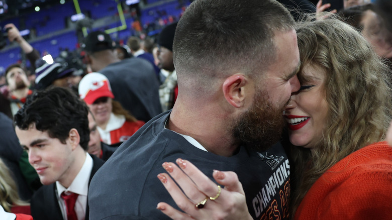 Taylor Swift and Travis Kelce after the Chiefs win the AFC Championship