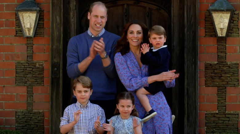 Wales family clapping outside in 2020