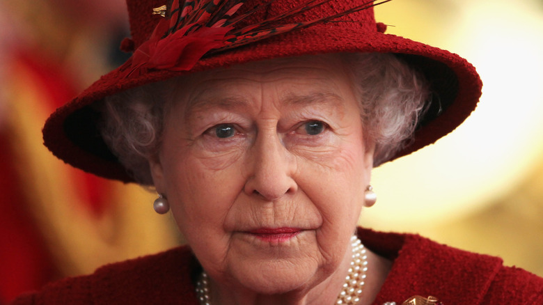 Queen Elizabeth II in red
