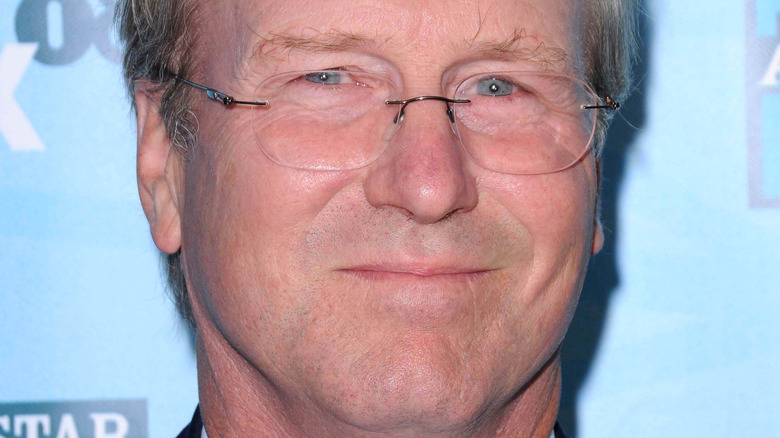 William Hurt wearing glasses