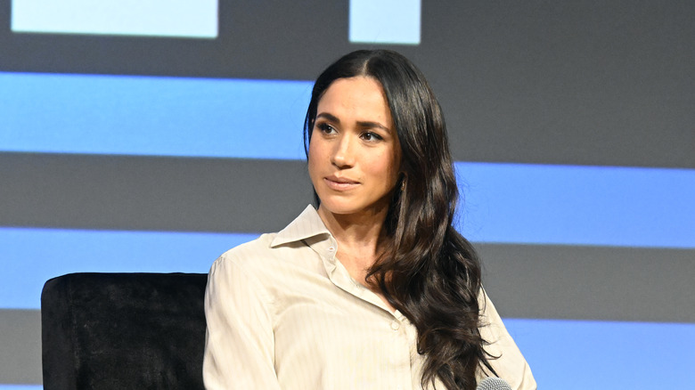 Meghan Markle sitting down