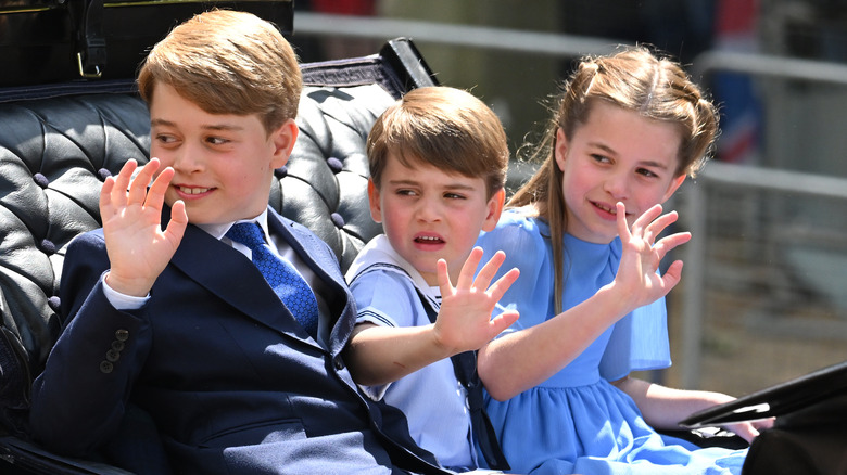 Prince George, Prince Louis, and Princess Charlotte waving