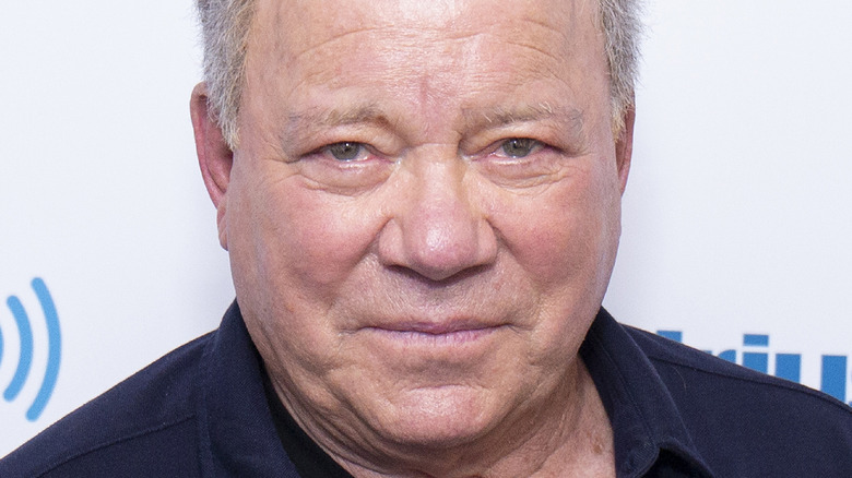 William Shatner poses on the red carpet