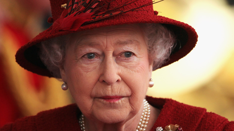 Queen Elizabeth looking somber