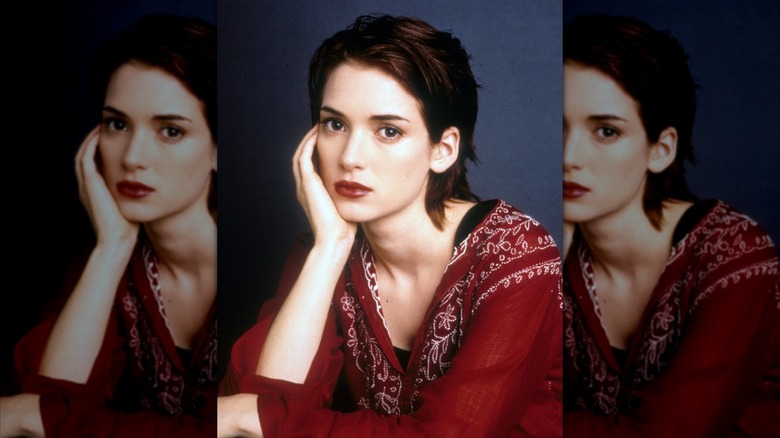 Winona Ryder poses with her hand on her chin