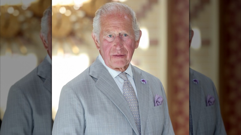 King Charles III staring