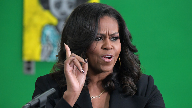 Michelle Obama with her finger raised