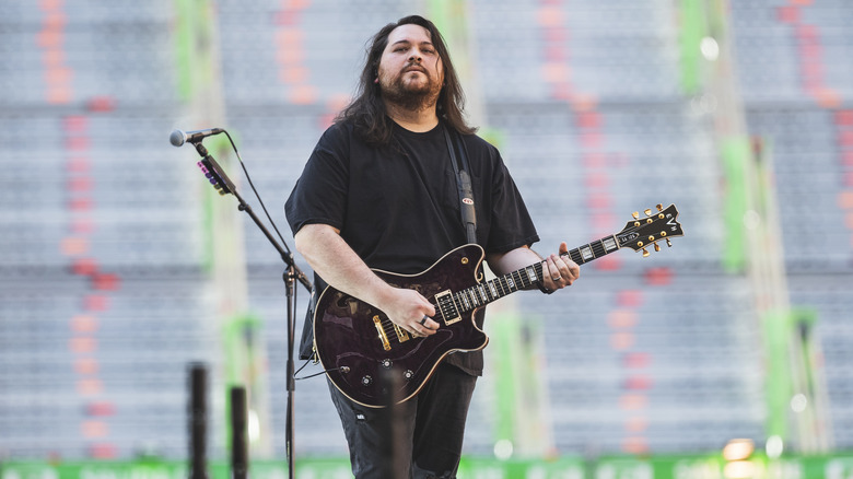 Wolfgang Van Halen performs on stage with guitar in Madrid, Spain