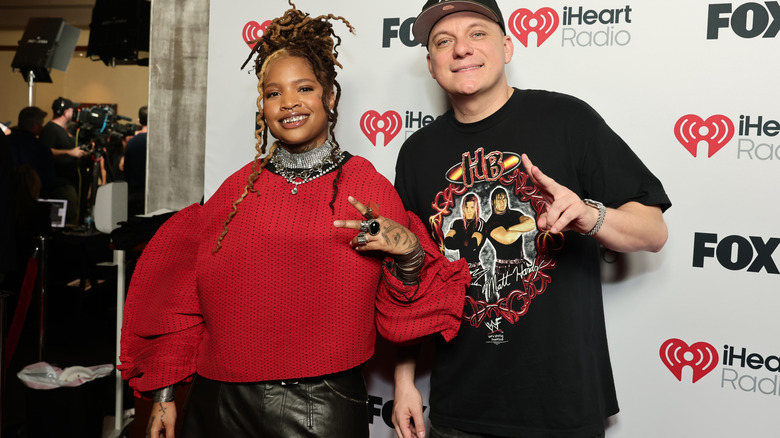 Ambré and Bootleg Kev on the red carpet at the 2025 iHeartRadio Music Awards