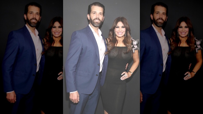 Donald Trump Jr and Kimberly Gulfoyle post for a red carpet photo at the 2019 Zang Toi New York Fashion Week show