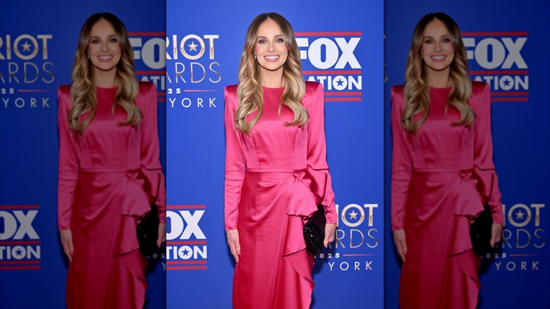 Tomi Lahren poses for a photo at the Fox Nation Patriot Awards in a pink dress