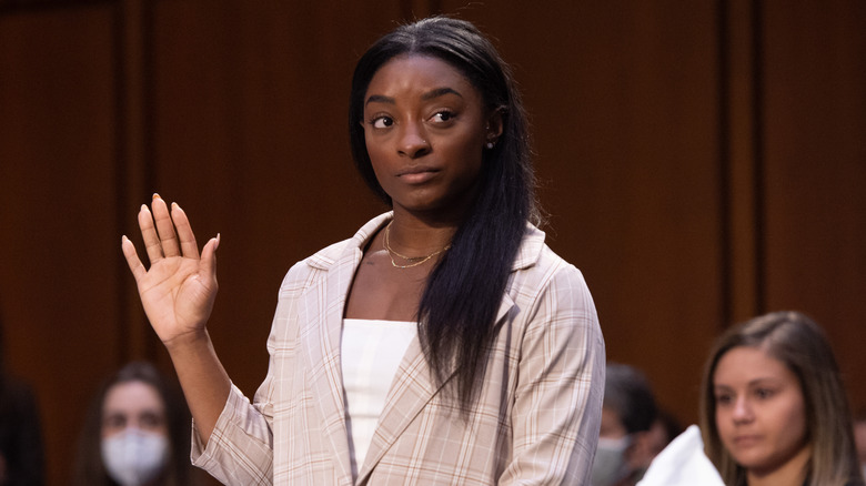 Simone Biles testifying in front of Congress