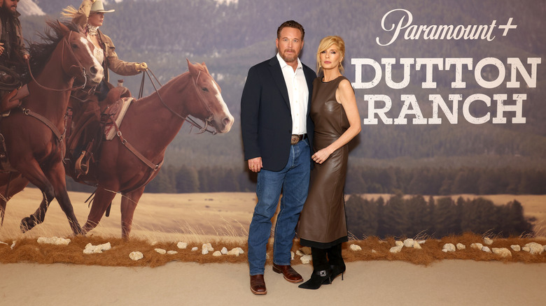 Kelly Reilly poses with Cole Hauser at event