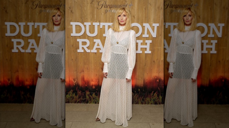 Kelly Reilly posing in lacy dress at Dutton Ranch event