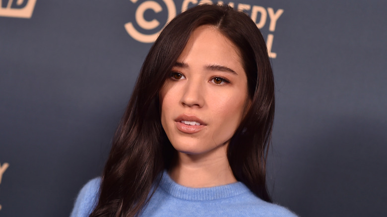 Kelsey Asbille posing in blue