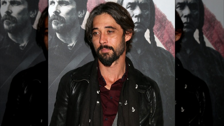 Ryan Bingham poses at the premiere of "Hostiles"