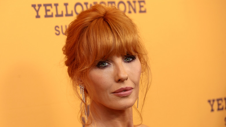 Kelly Reilly in front of yellow backdrop