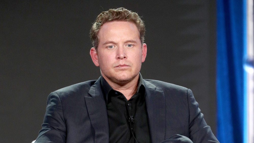 Yellowstone's Cole Hauser speaks onstage at an event 