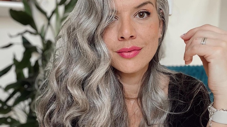 Woman with long gray hair