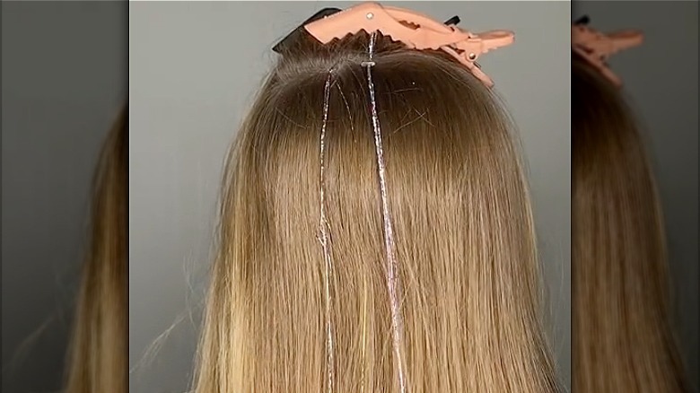 Tinsel beads in hair