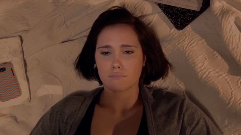Eden Brolin as Dora in "I Dream Too Much" lying on a bed looking up at the ceiling