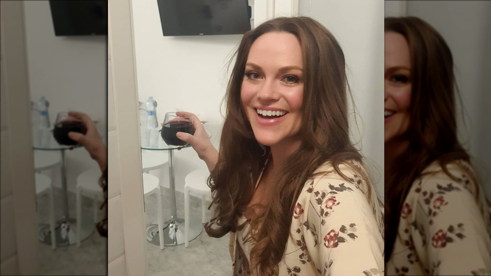 Below Deck's Chef Rachel drinking wine