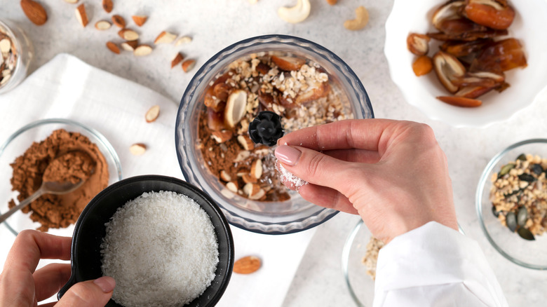 Sprinkling salt into a food processor