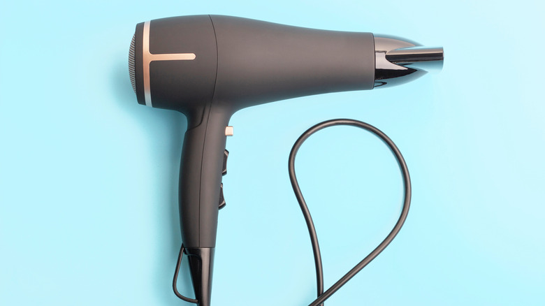 Black and gold hair dryer