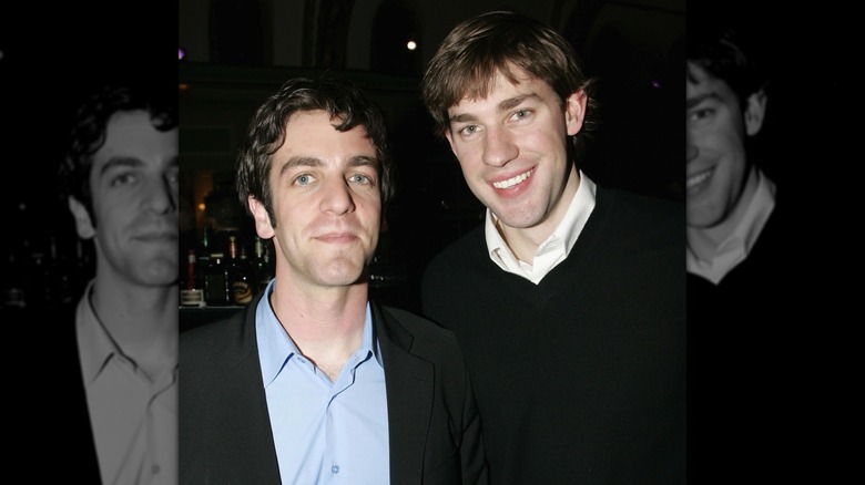 B.J. Novak and John Krasinski smiling for the cameras together