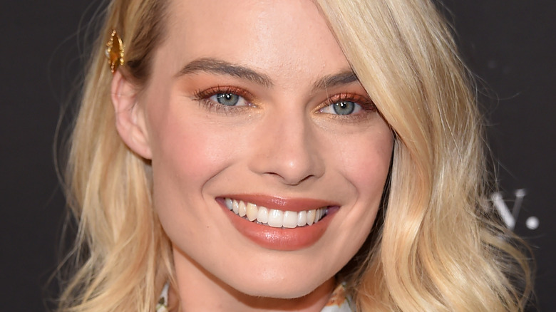 Margot Robbie smiling for the camera