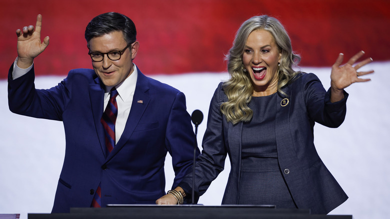 Speaker of the House Mike Johnson (R-LA) and his wife, Kelly Johnson, appear on stage on the second day of the Republican National Convention at the Fiserv Forum on July 16, 2024 in Milwaukee, Wisconsin