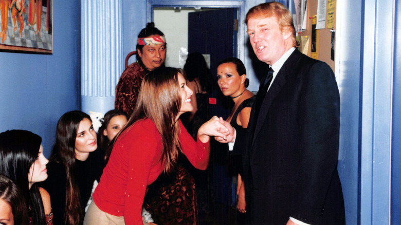 Melania Trump curtseying to Donald Trump in 1999