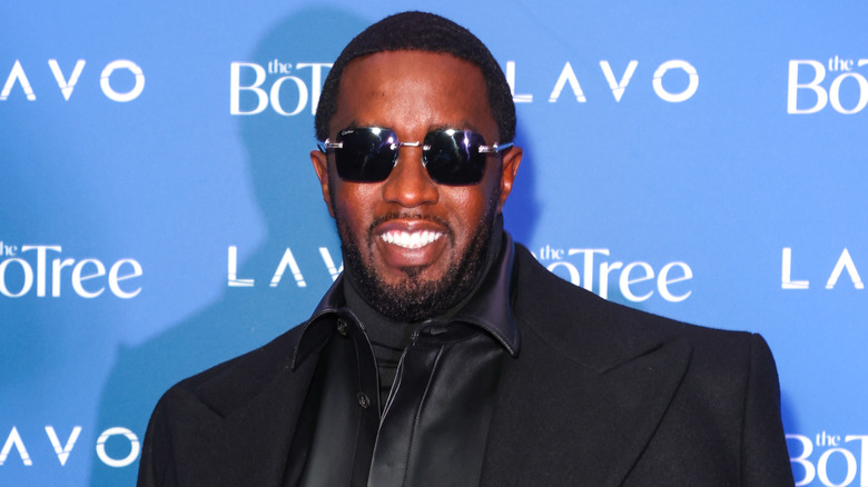 Diddy posing at a red carpet event