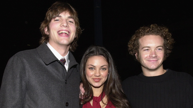 Ashton Kutcher, Mila Kunis, and Danny Masterson in December 2000