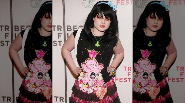 Kelly Osbourne posing