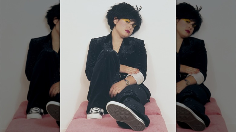 Kelly Osbourne posing