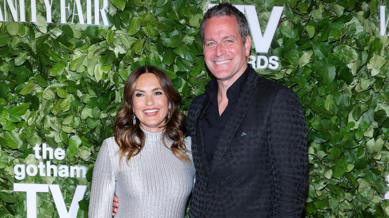 Mariska Hargitay and Peter Hermann smiling at the Gotham TV Awards