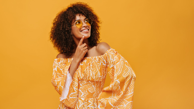 Woman in yellow shirt