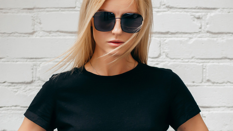 Woman black shirt sunglasses