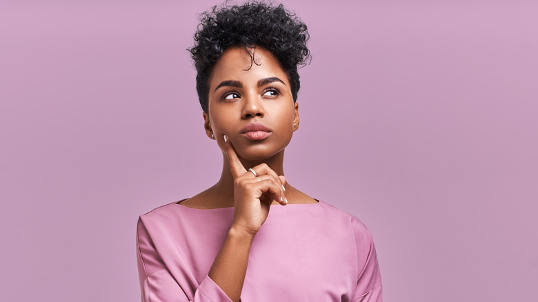 woman wearing purple clothes
