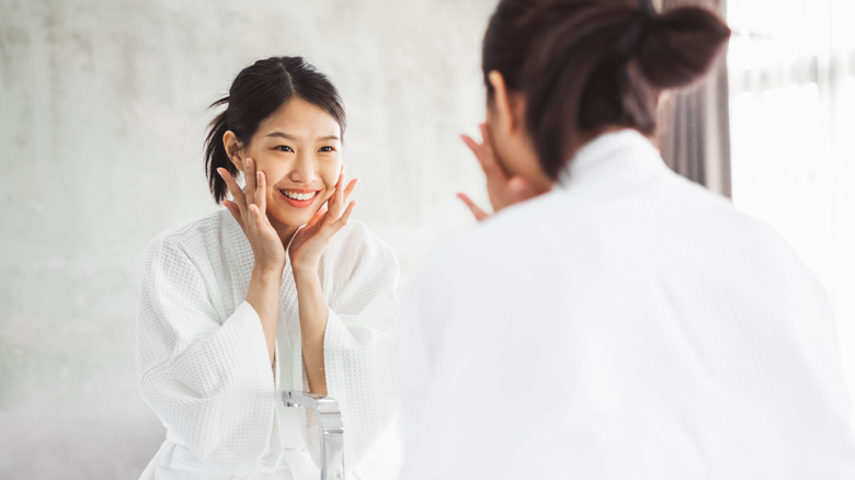 Woman looking at herself