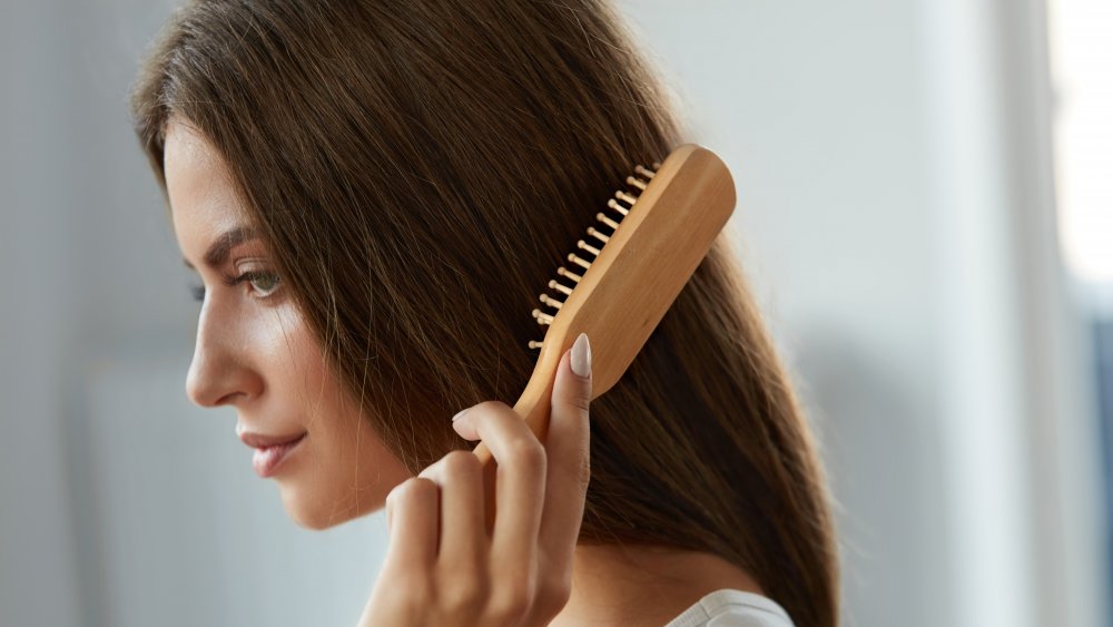 Woman brushing her hair